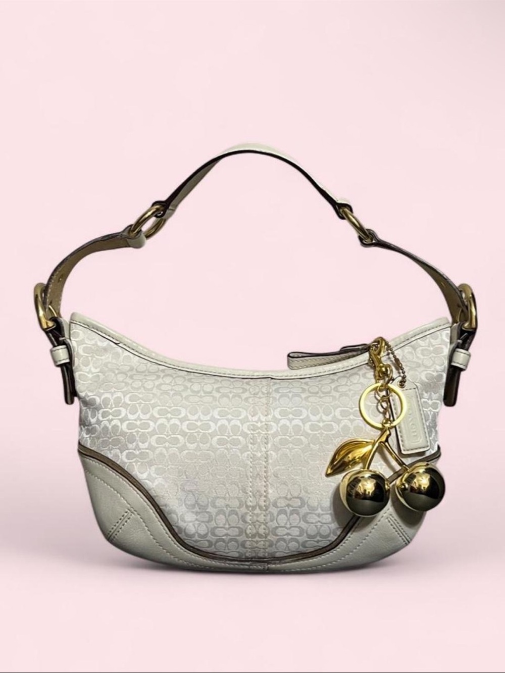 coach white hobo bag with gold details 🤍